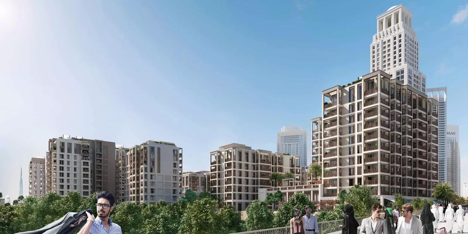 Summer at Creek Beach building facade with waterfront views, Dubai Creek Harbour