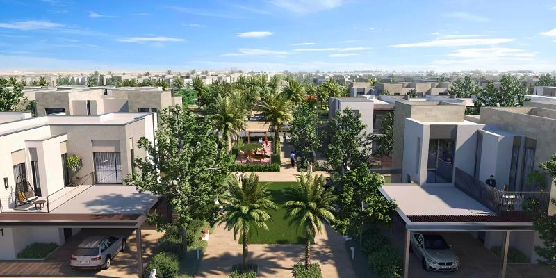 Sun townhouse exterior with landscaped front garden, Arabian Ranches 3, Dubai