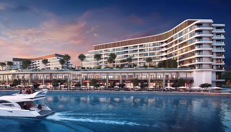 Exterior view of V1VID Residence tower facade in Jumeirah Village Triangle, Dubai