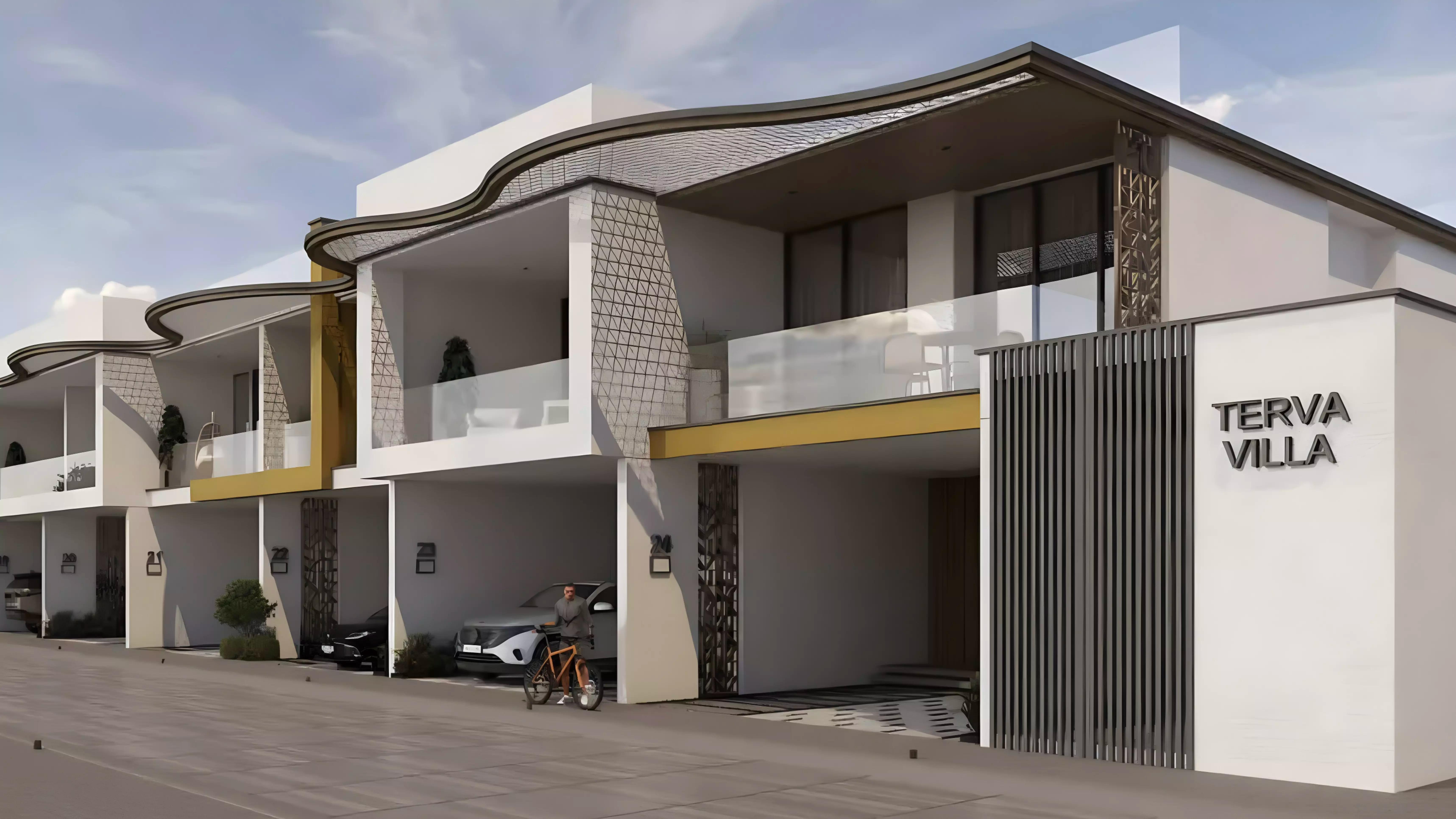 Terva Homes townhouse exterior with landscaped front garden, Dubai Industrial City
