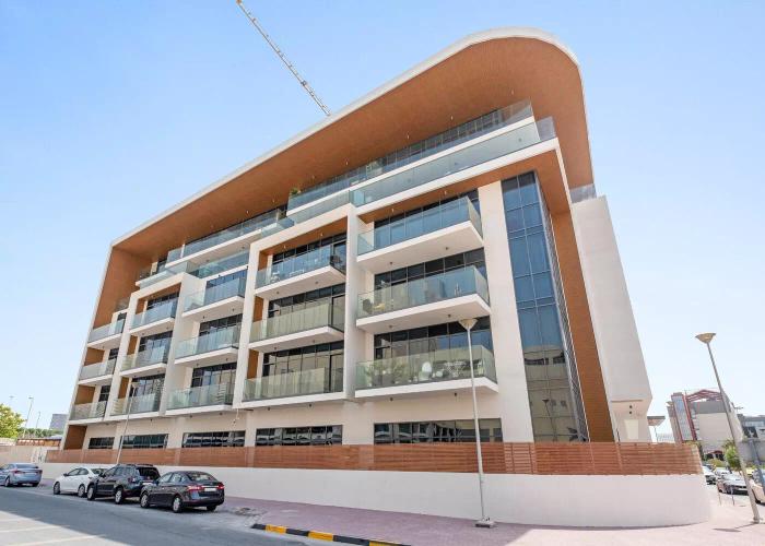 Exterior facade of Taraf 2 Residence apartment building in Jumeirah Village Triangle, Dubai