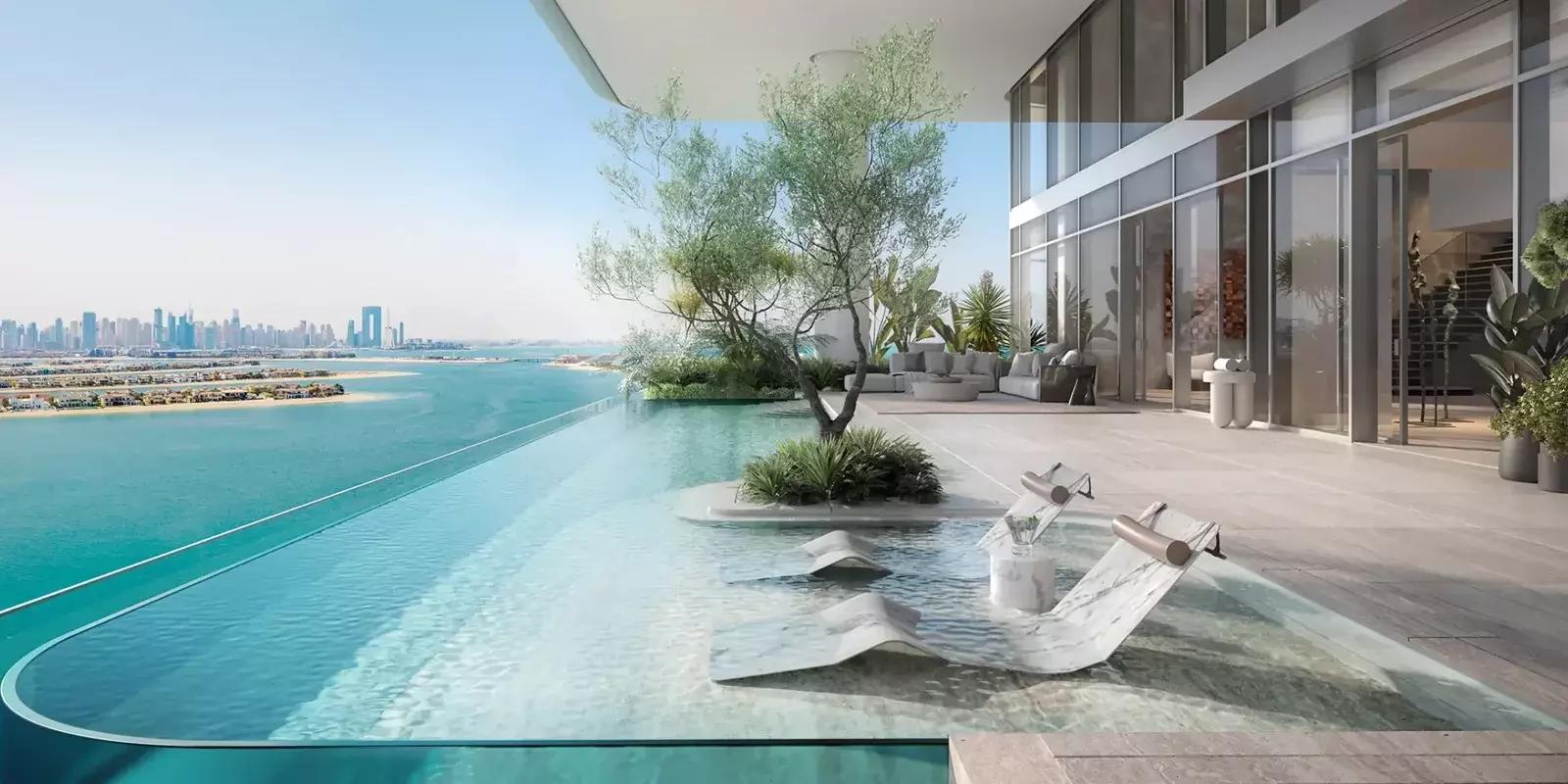 Orla Infinity shared pool deck overlooking the Palm Jumeirah coastline, Dubai