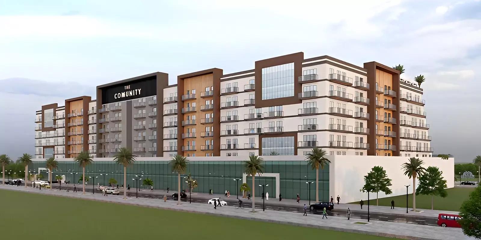Exterior view of The Community Motor City apartment building, Motor City, Dubai