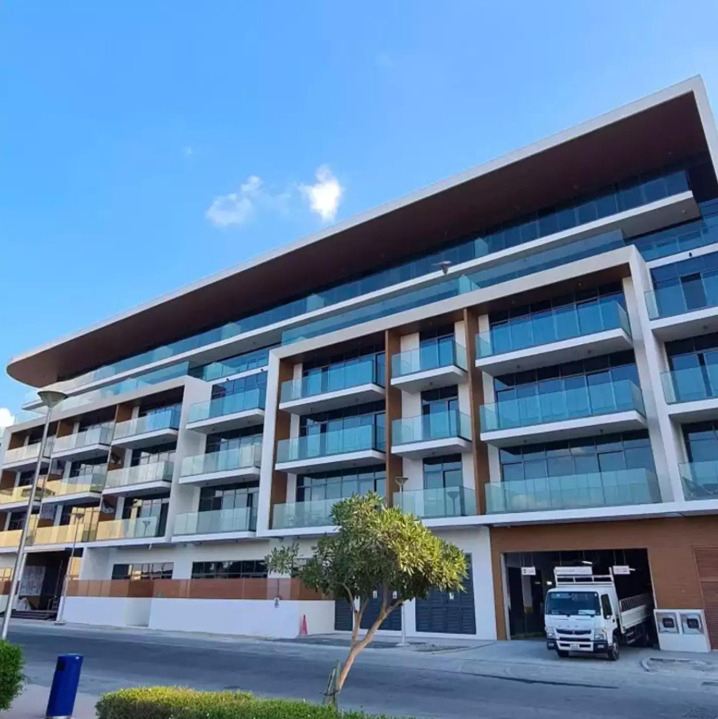 Building entrance and landscaping at Taraf 2 Residence, JVT, Dubai