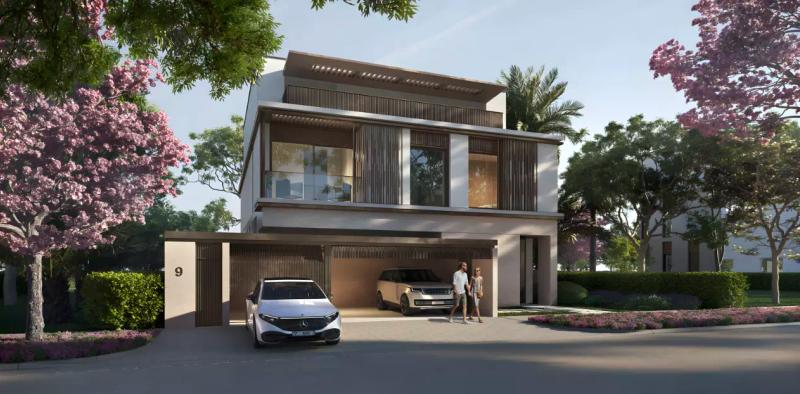 Townhouse exterior with landscaped front garden at Nad Al Sheba Gardens Phase 4
