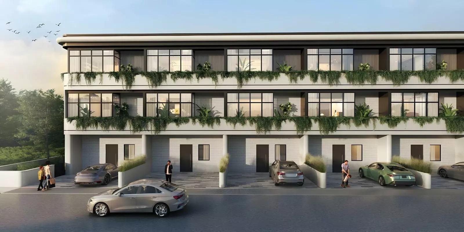 Taormina Village community pool area surrounded by loungers, Majan, Dubai