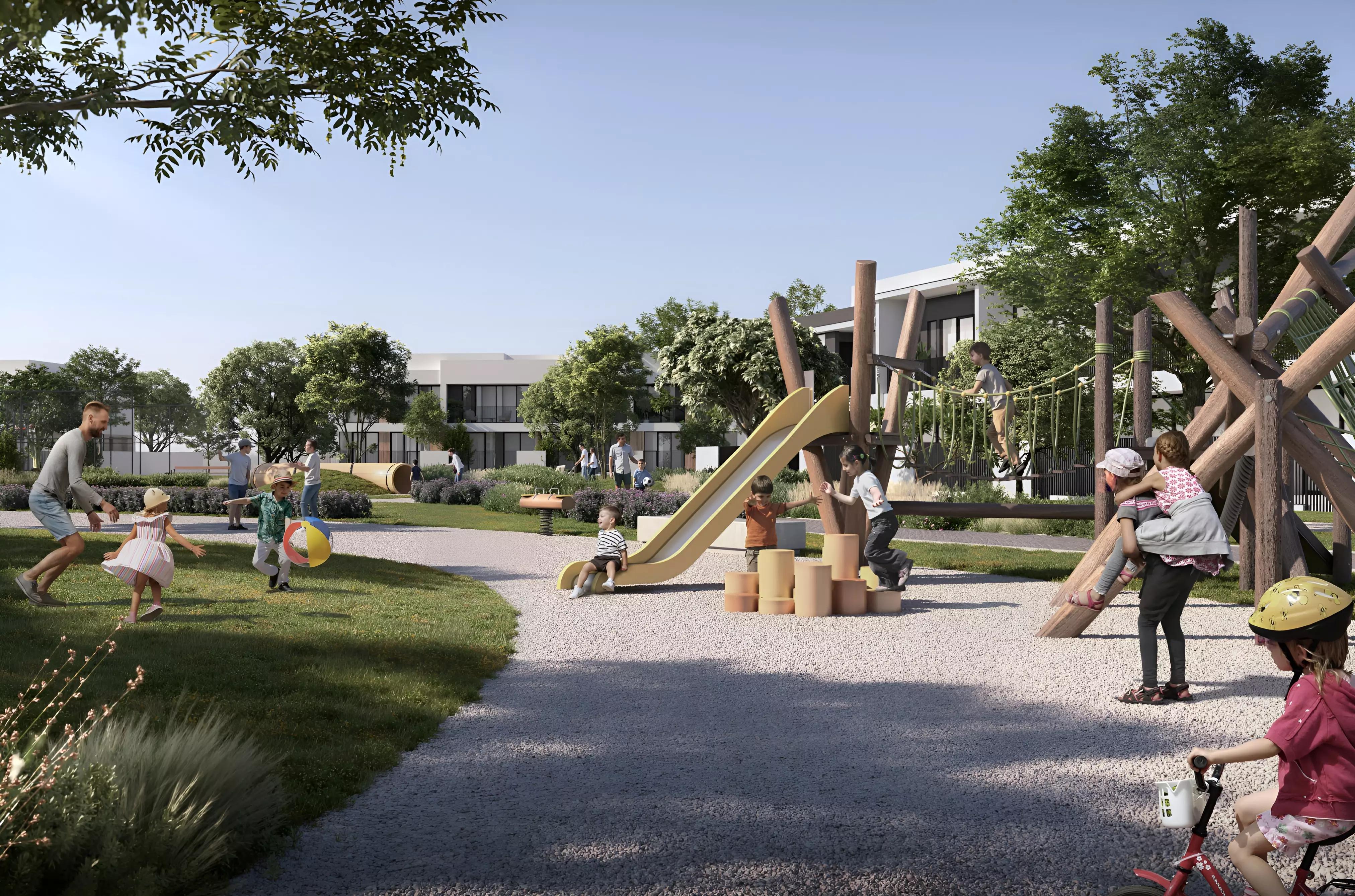 Equiterra residential street view with low-rise townhouse rows, Dubai Investment Park 2