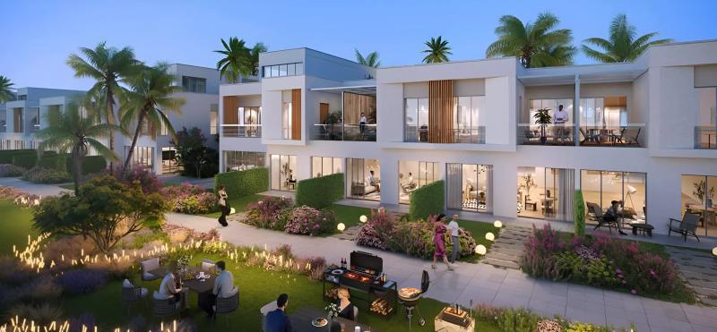 Lush townhouse exterior with landscaped surroundings at DAMAC Riverside, DIP, Dubai
