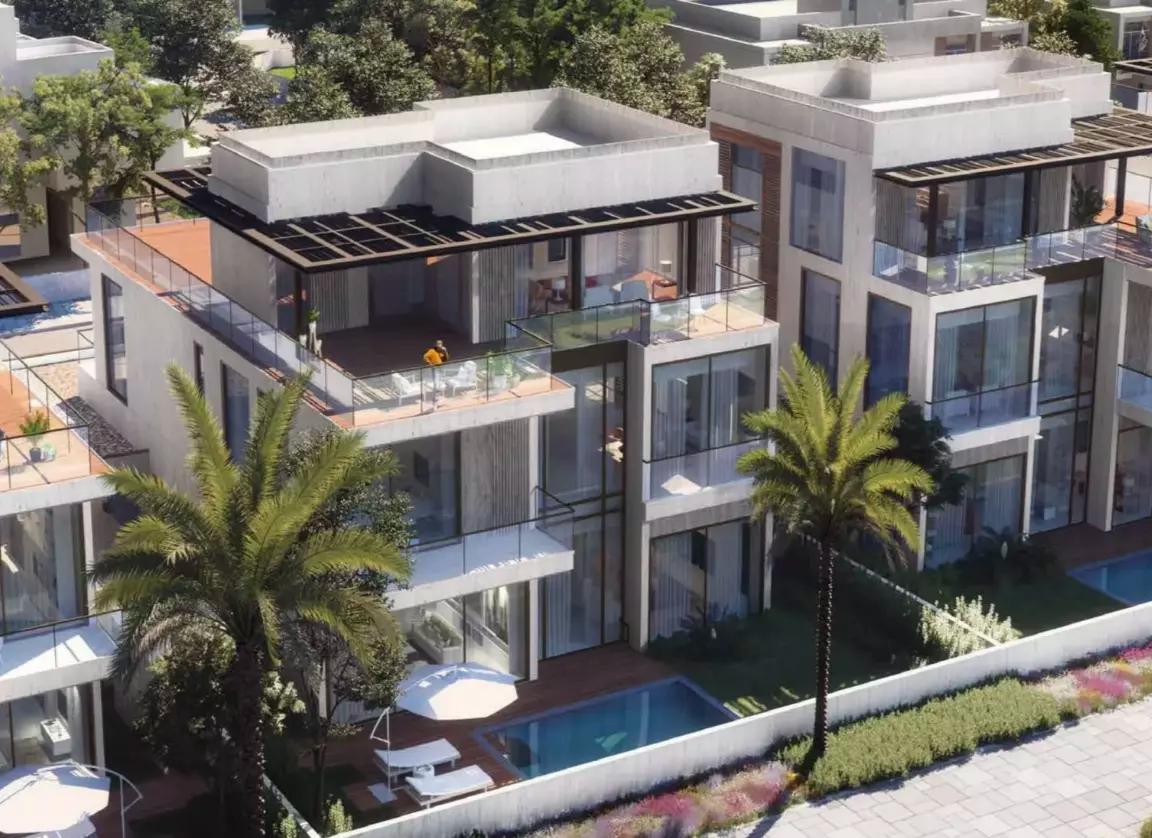 South Bay Phase 5 community street view with villas, Dubai South
