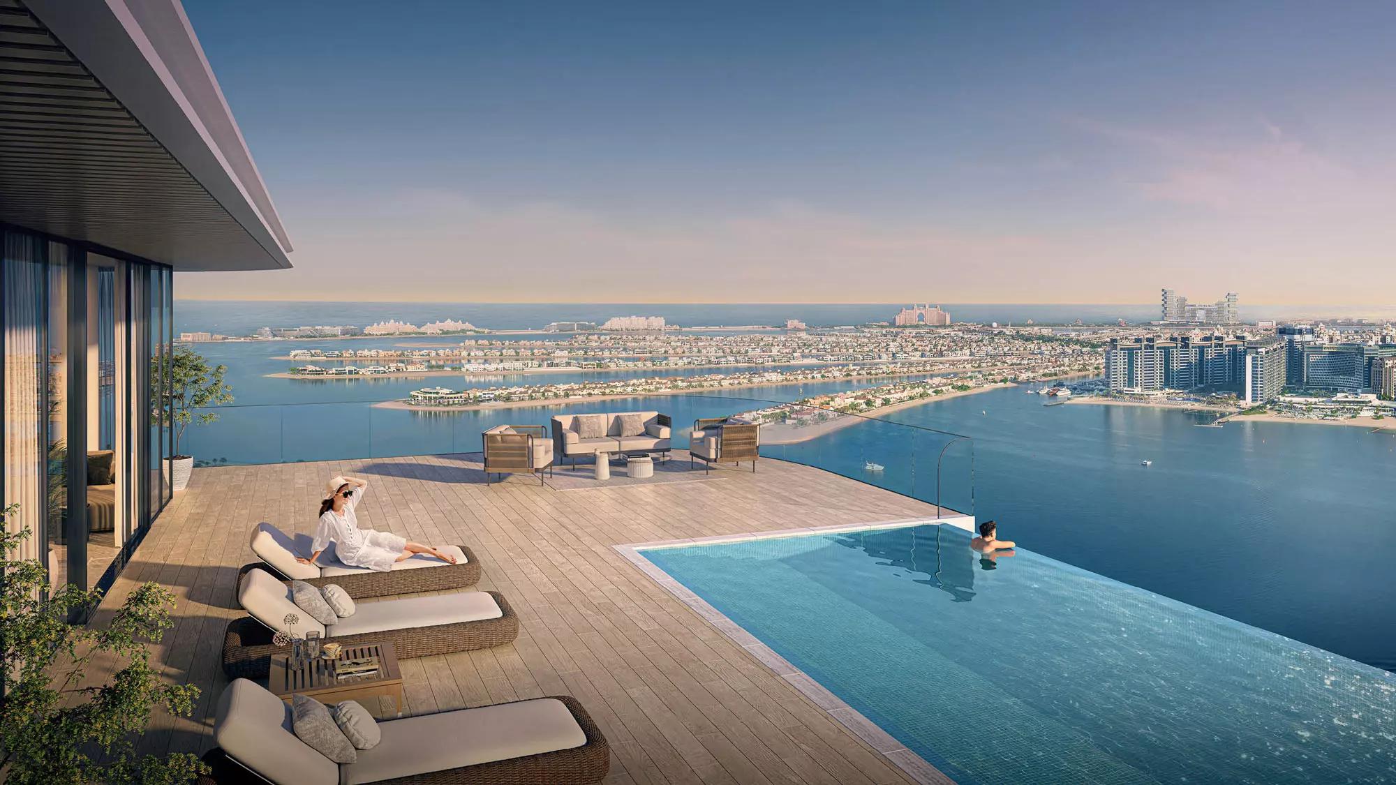 Seapoint podium-level pool with Dubai skyline backdrop