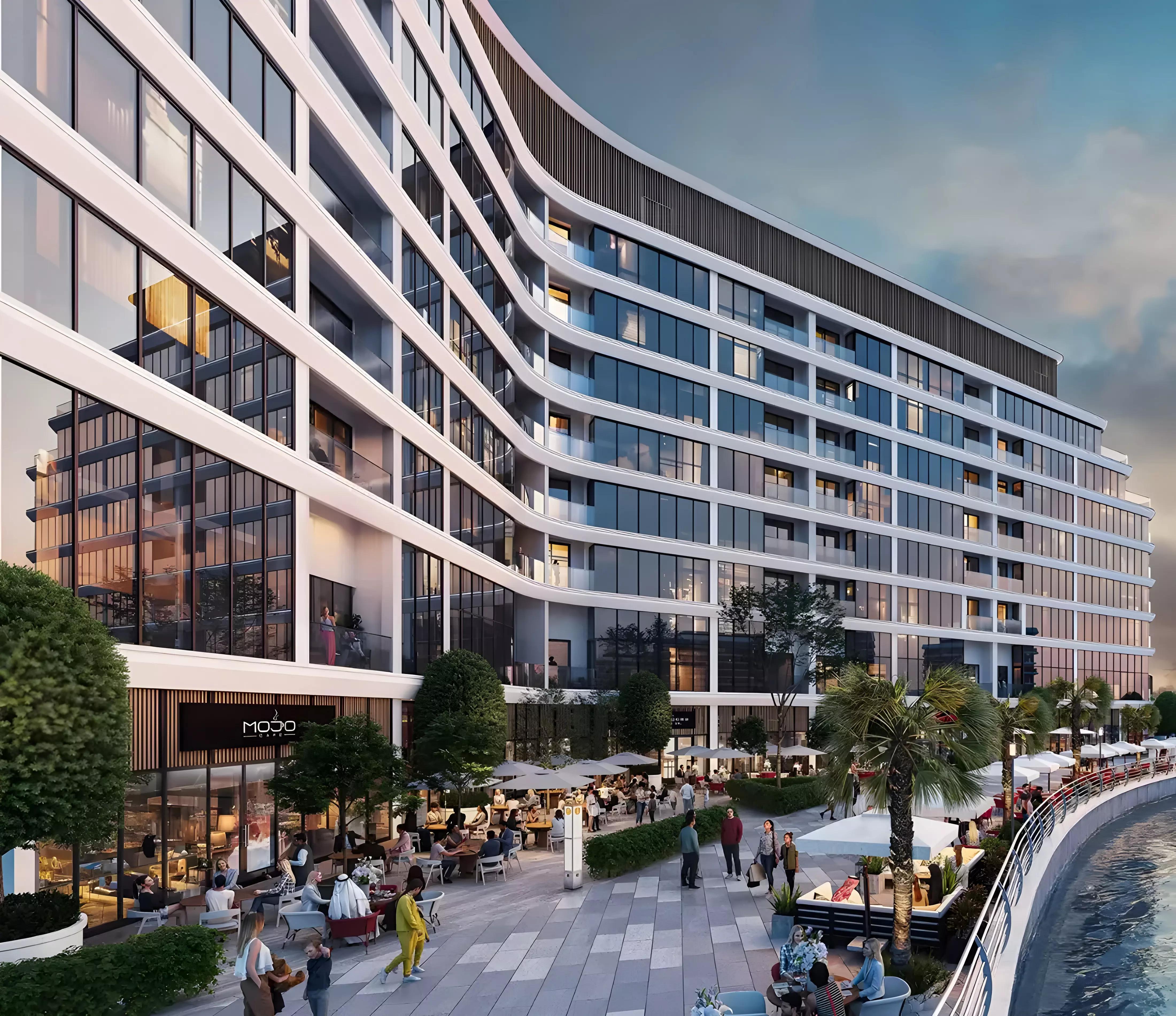 Exterior view of V1VID Residence tower facade in Jumeirah Village Triangle, Dubai
