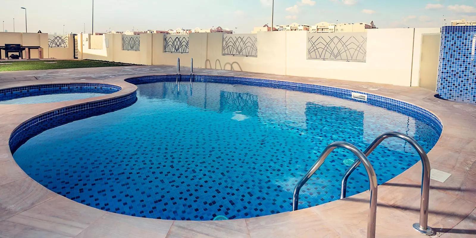 Westar Terrace Garden townhouse facade and driveway, District 13 JVC, Dubai