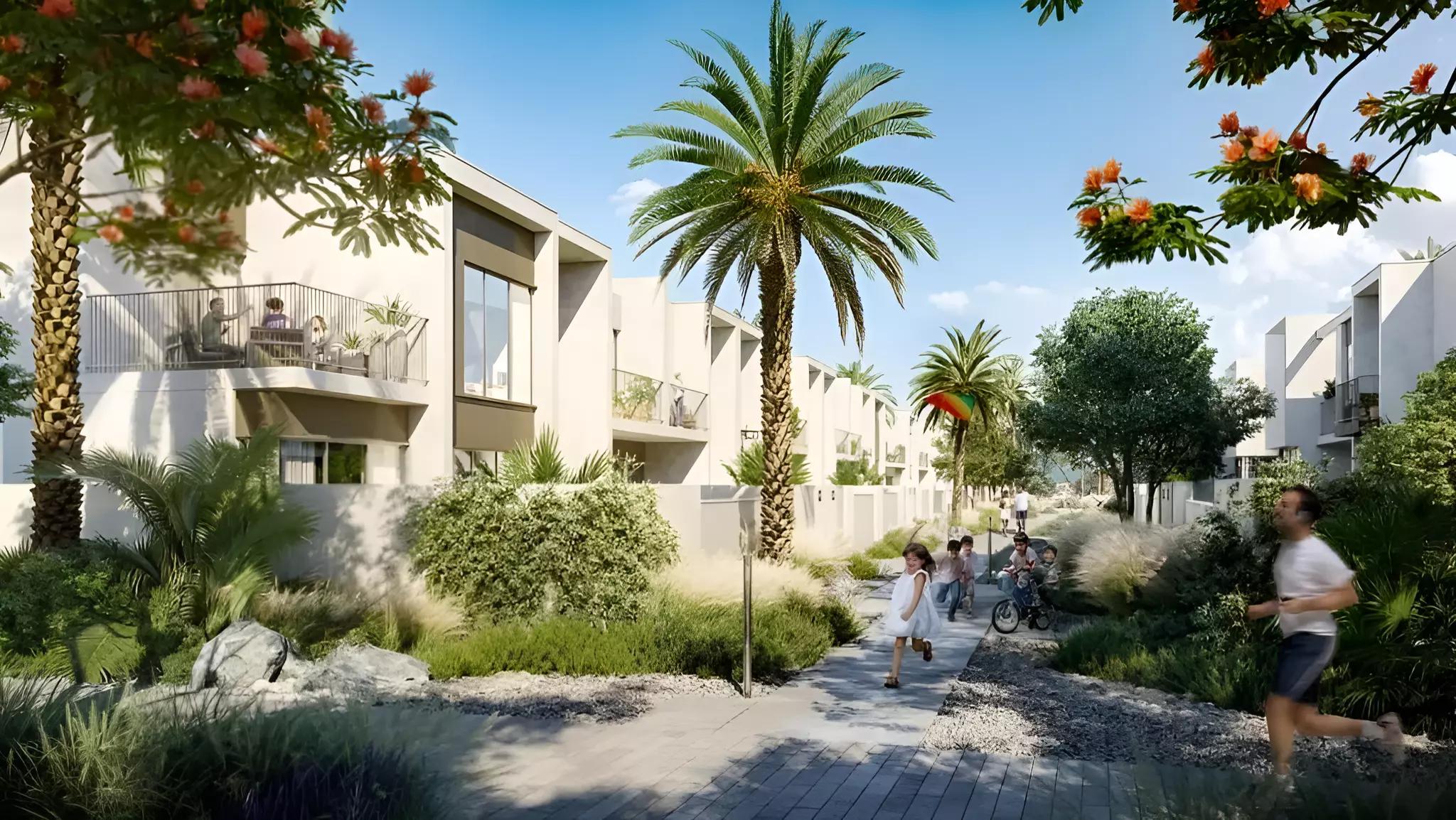 Nara Phase 2 townhouse row along a community street, The Valley, Dubai