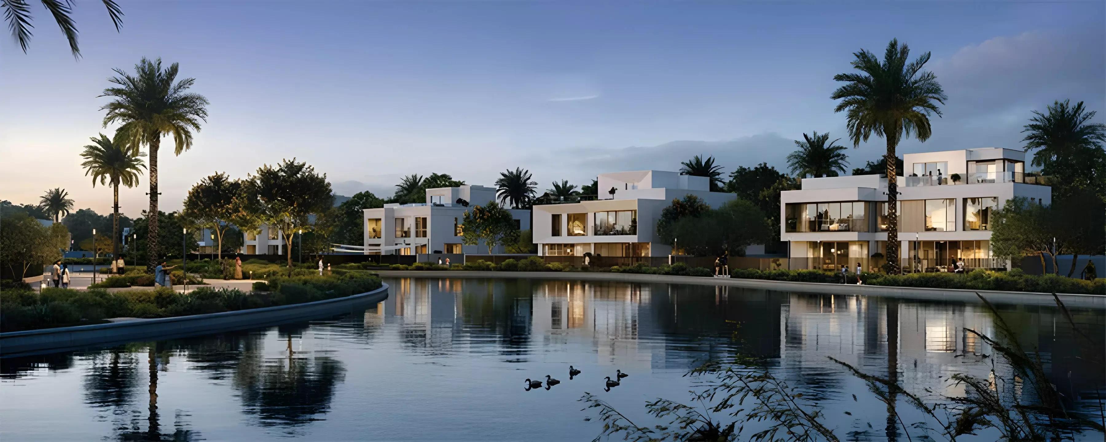 Landscaped grounds and pathway at Oasis Address Branded Villas, The Oasis by Emaar