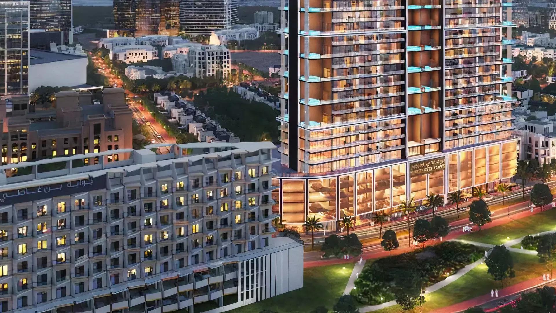 Shared swimming pool area at Binghatti Onyx apartment building, Dubai