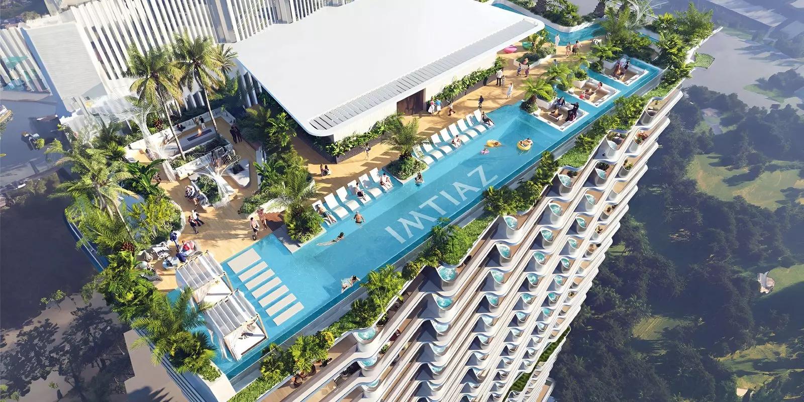 Cove shared pool deck at Dubai Land Residence Complex