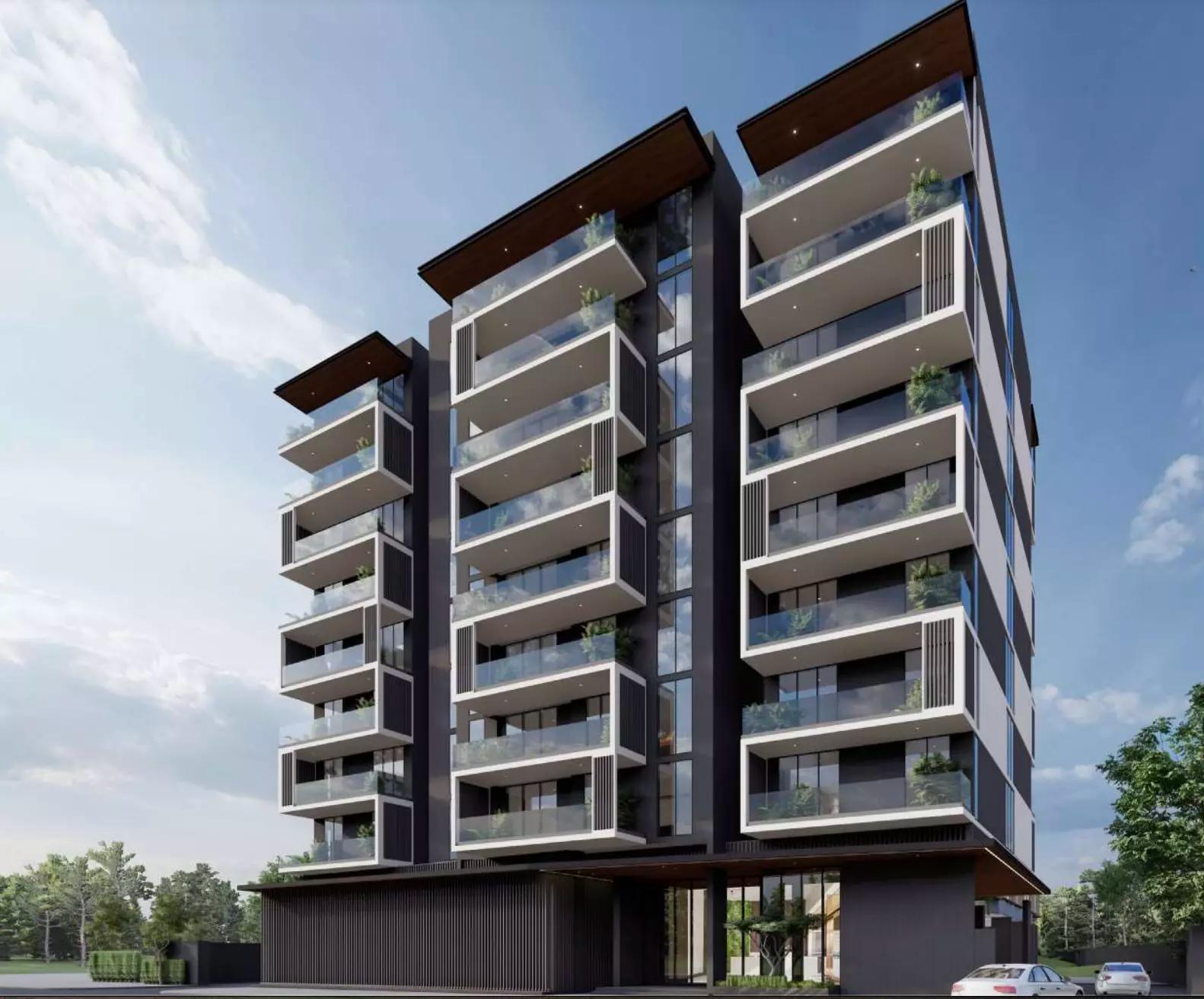 Aura Elegance building view showing balconies and landscaping