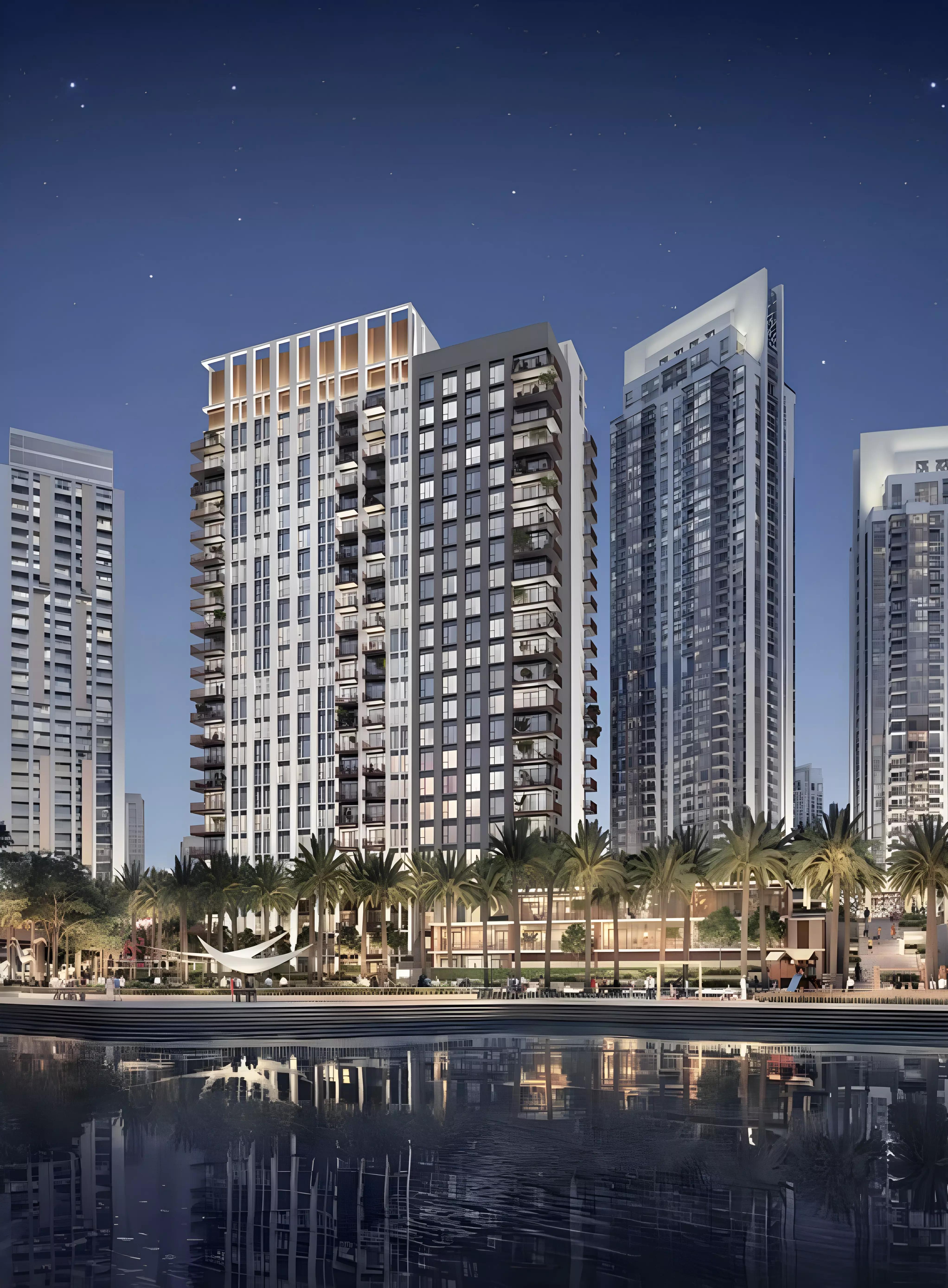 Creek Crescent apartment building facade with landscaped grounds, Dubai Creek Harbour