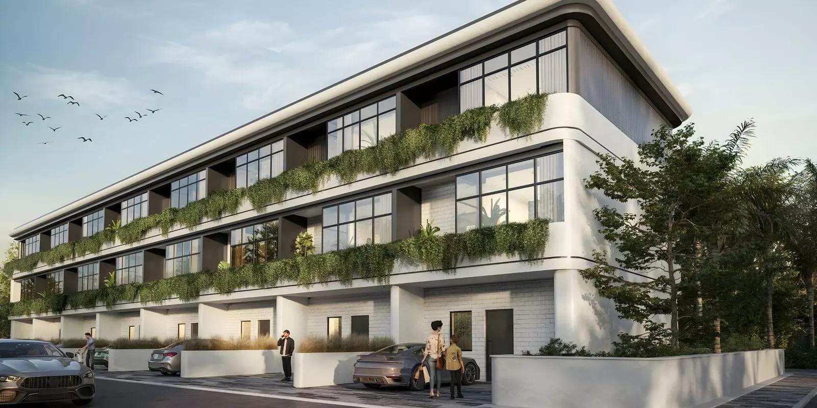 Taormina Village townhouse exterior with landscaped frontage, Majan, Dubai