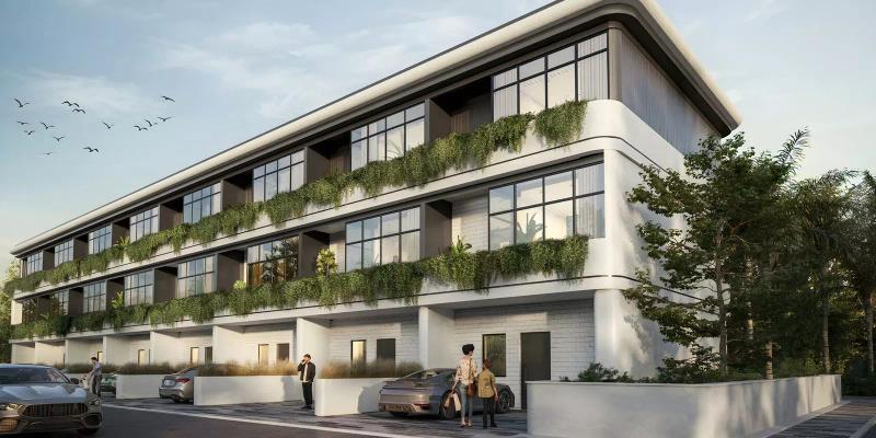 Taormina Village townhouse exterior with landscaped frontage, Majan, Dubai