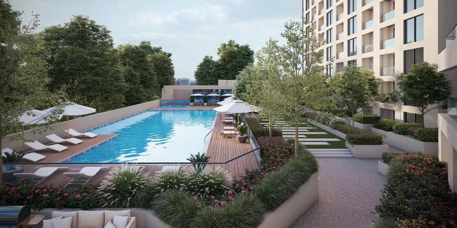 Living area interior with water and skyline views at Sobha Creek Vistas Grande, Dubai