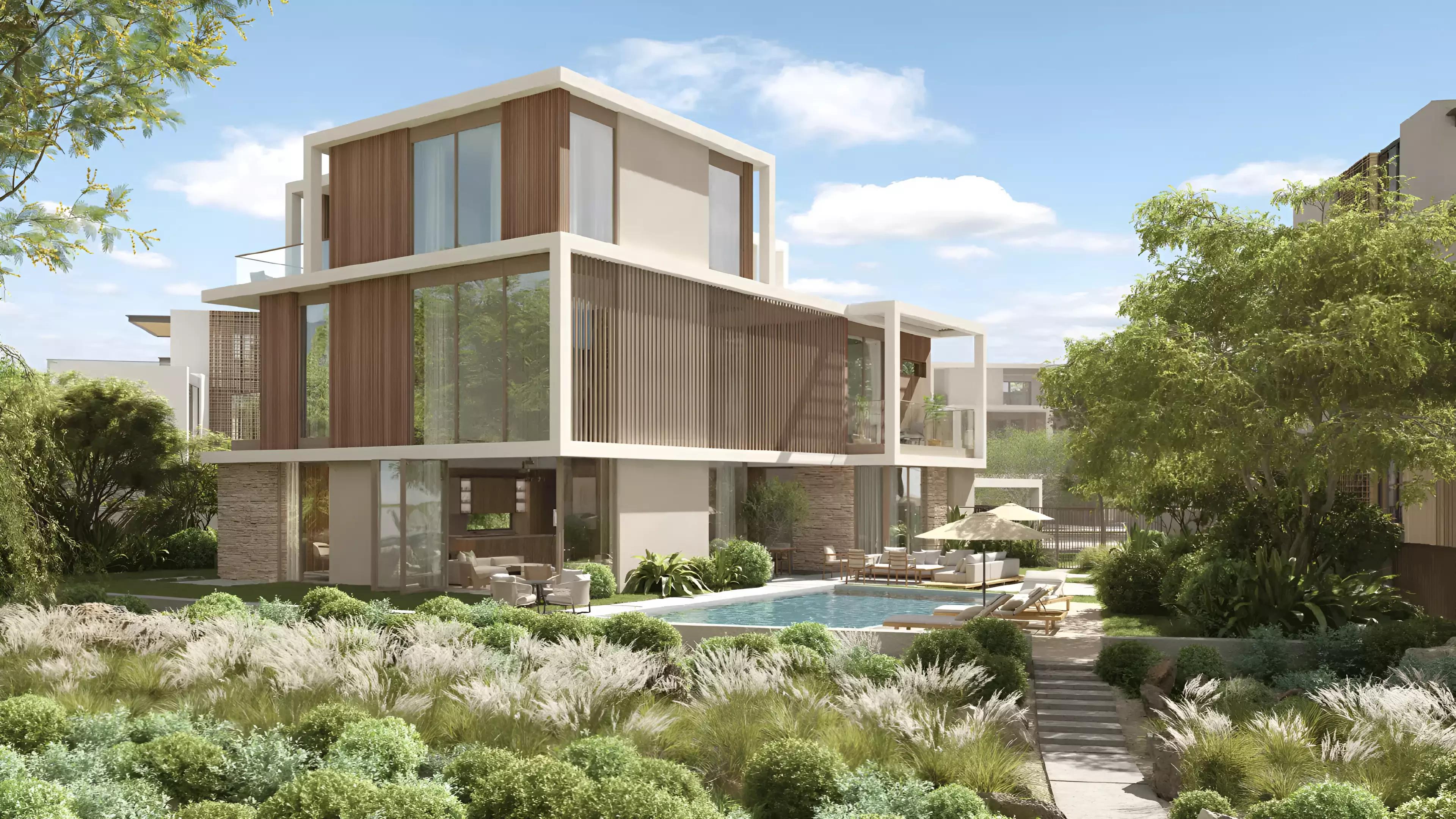 The Acres Phase 3 villa exterior with landscaped front garden, Dubai Land, Dubai