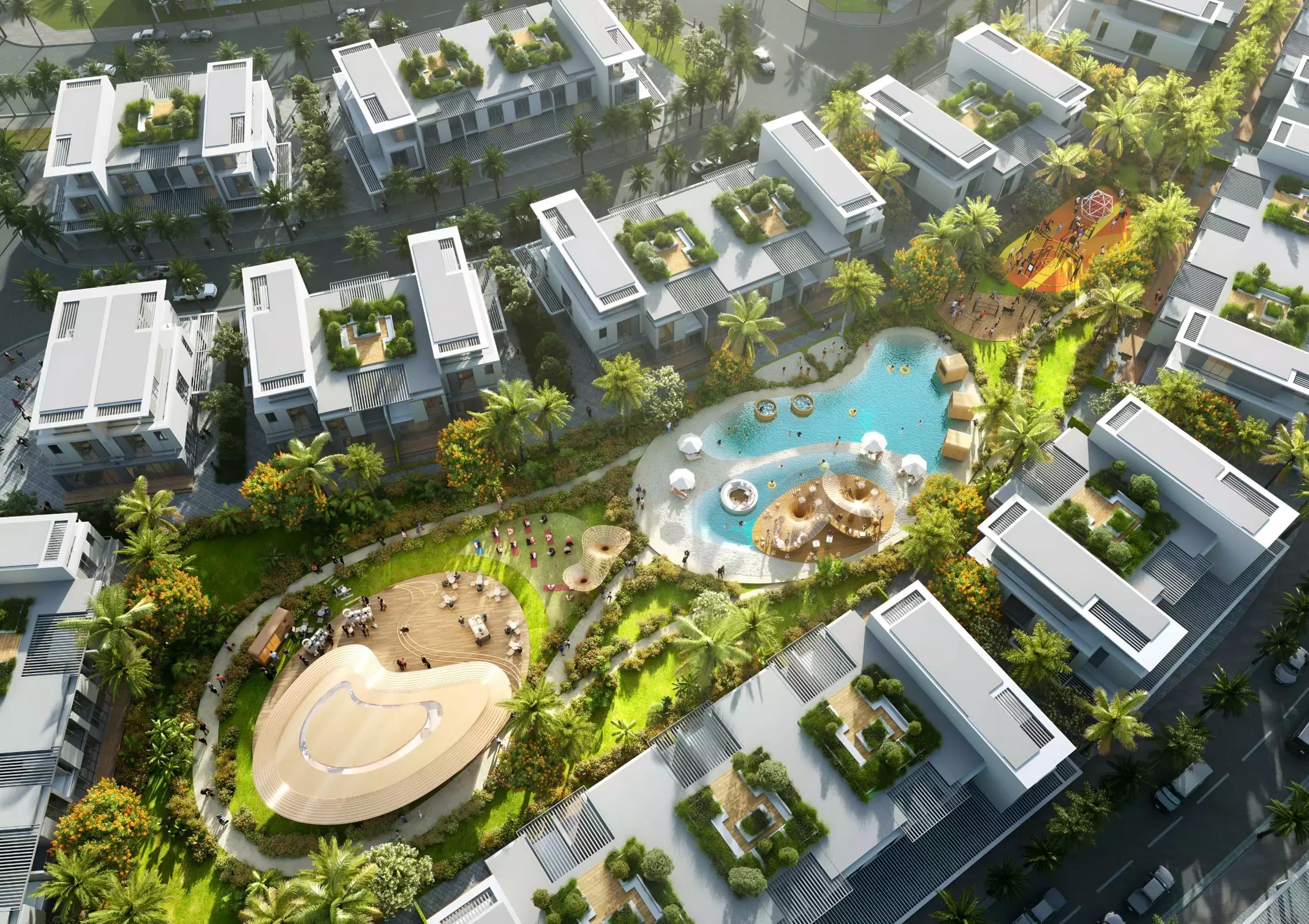 Damac Sun City residential street view showing townhouse row, Dubai Land, Dubai