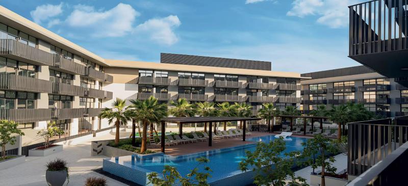 Exterior facade of The Portman apartment building by Ellington in JVC, Dubai