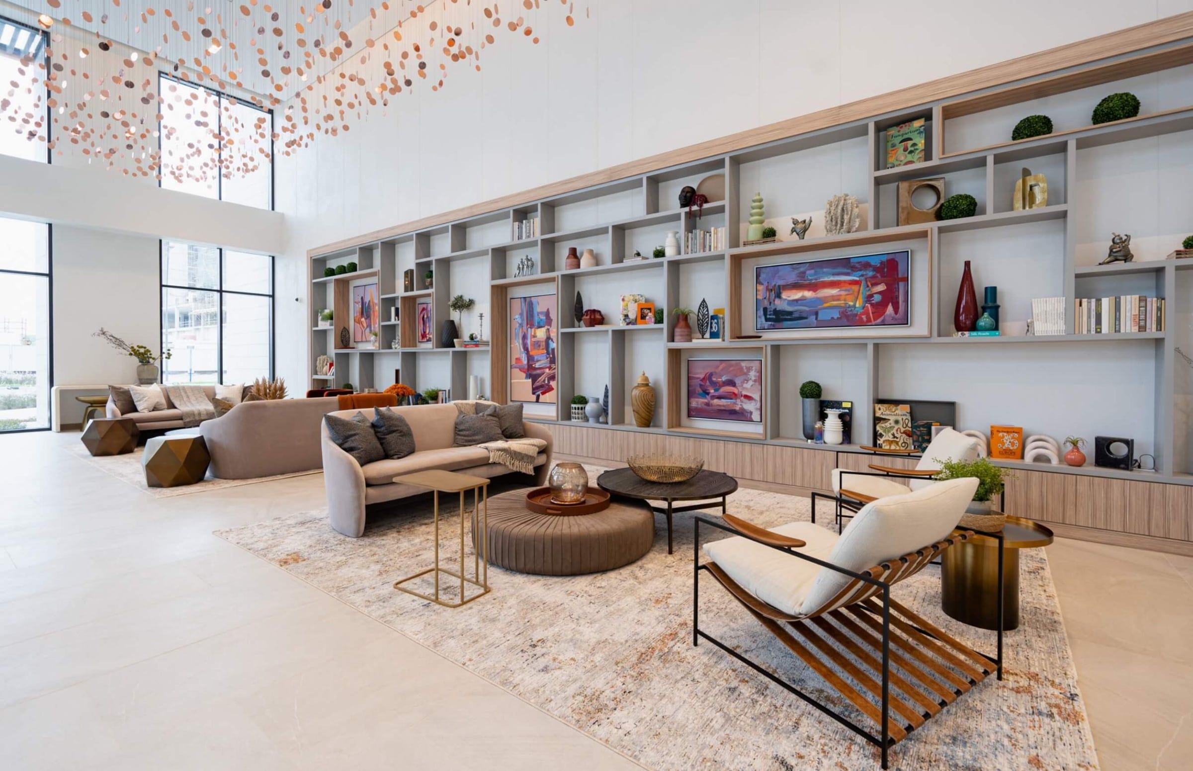 Wilton Terraces residents lounge with double-height library shelving
