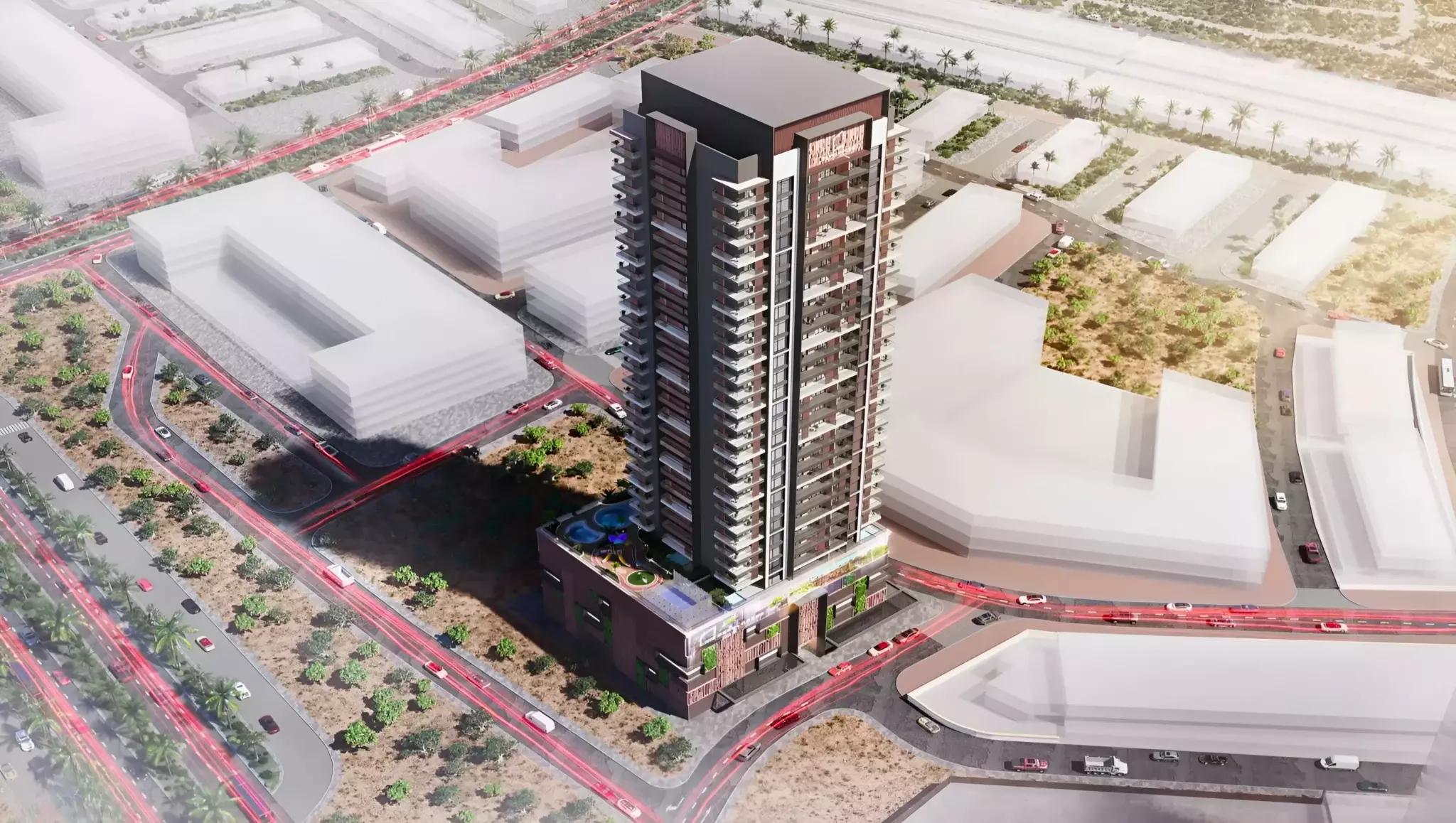 Exterior facade of Q Gardens Aliya apartment tower in Jumeirah Village Circle, Dubai