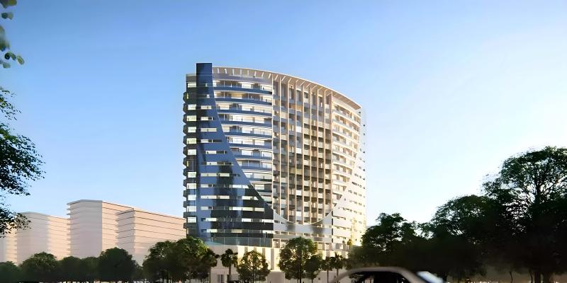 Exterior facade of V Tower residential building in Dubai Land Residence Complex