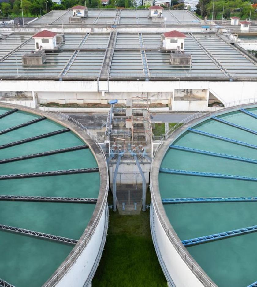 Aerial view of circular clarifier tanks at a water treatment plant
