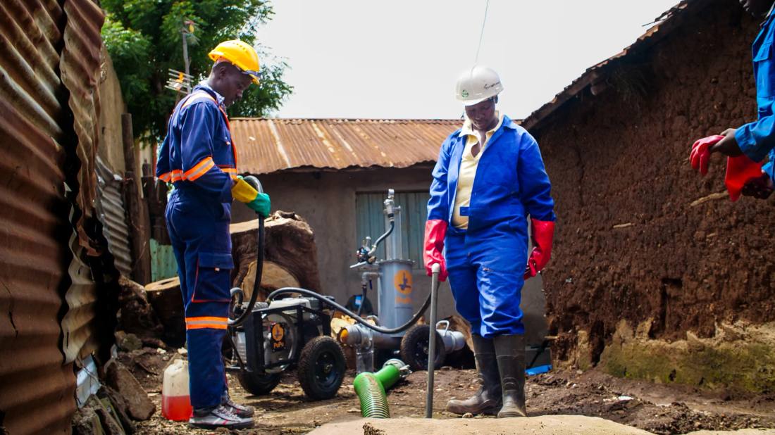 Men working on water pipes.