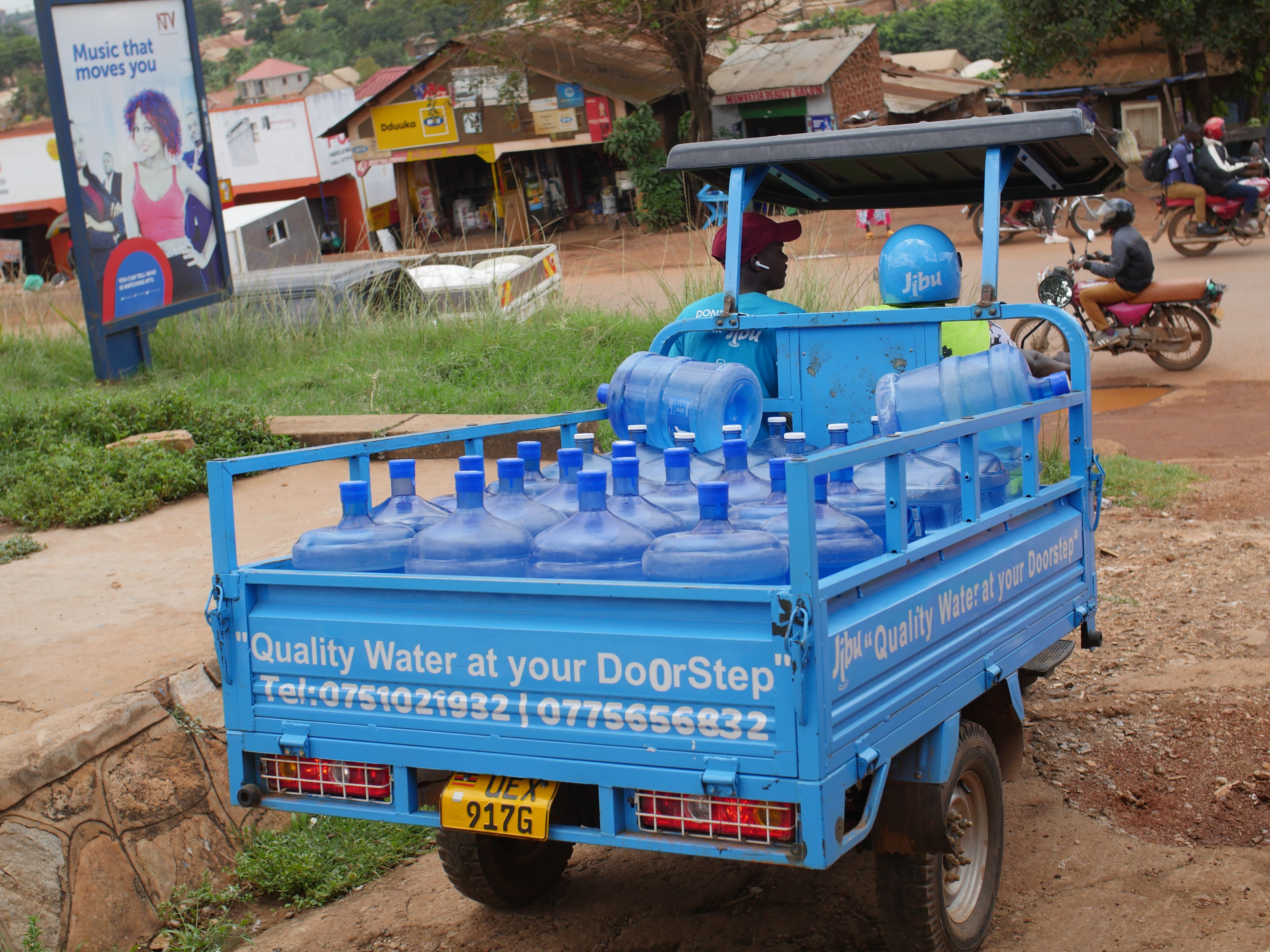 Truck delivering drinking water in a village