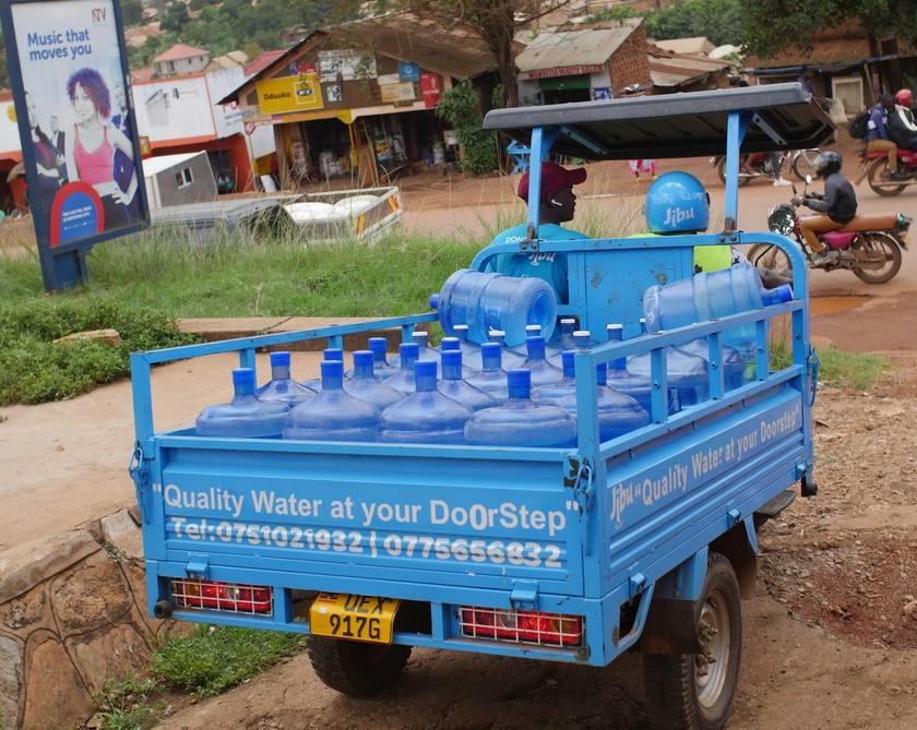 Truck delivering drinking water in a village