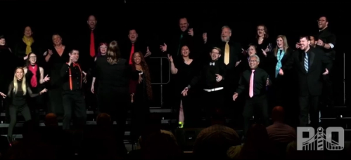Photo of MI-X chorus performing