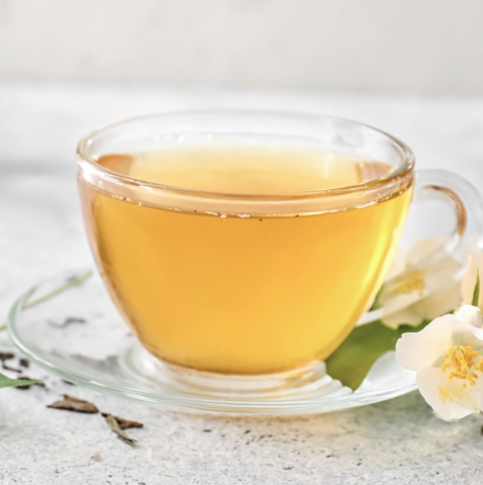 fresh flowers directly with dry green tea leaves