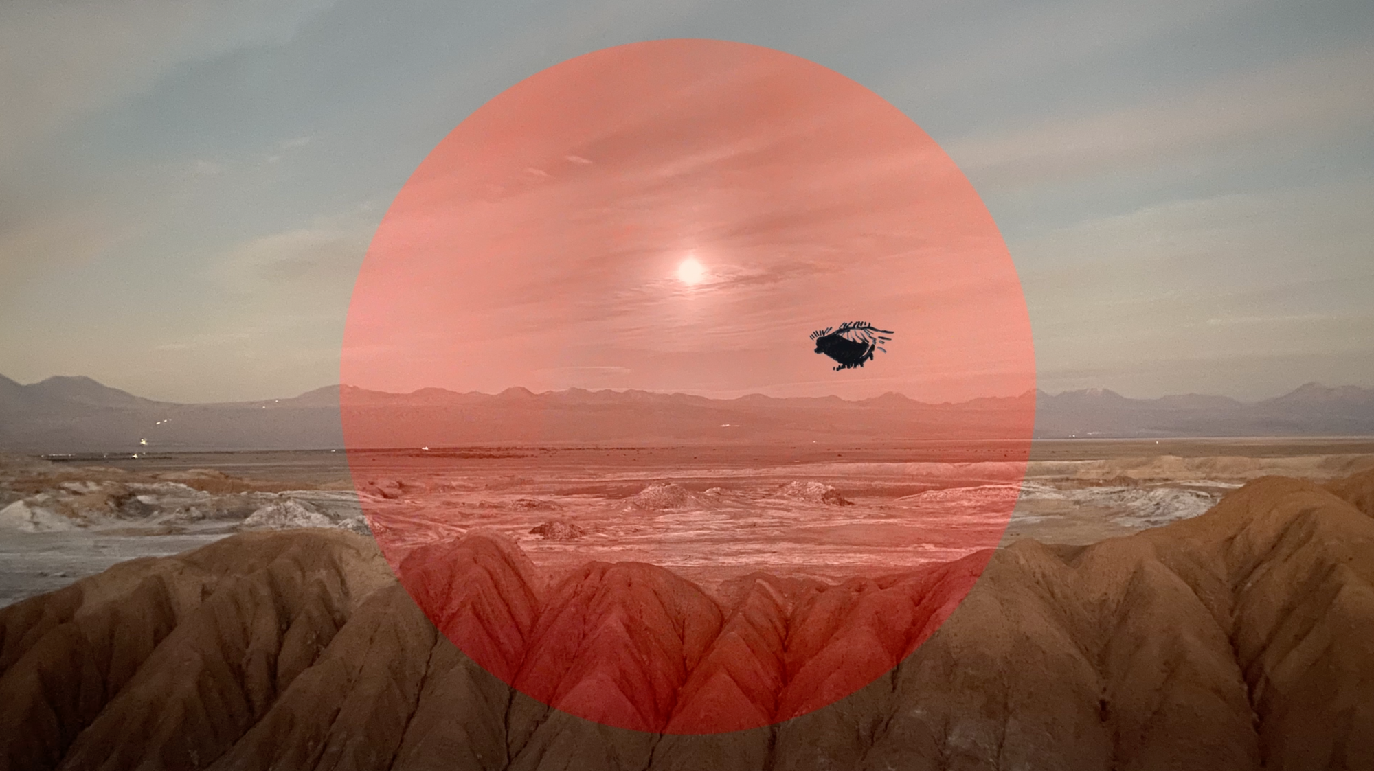 Giant red circle in the foreground hovering over a desert, mountainous landscape. A small shadowed creature flies in front of the circle.