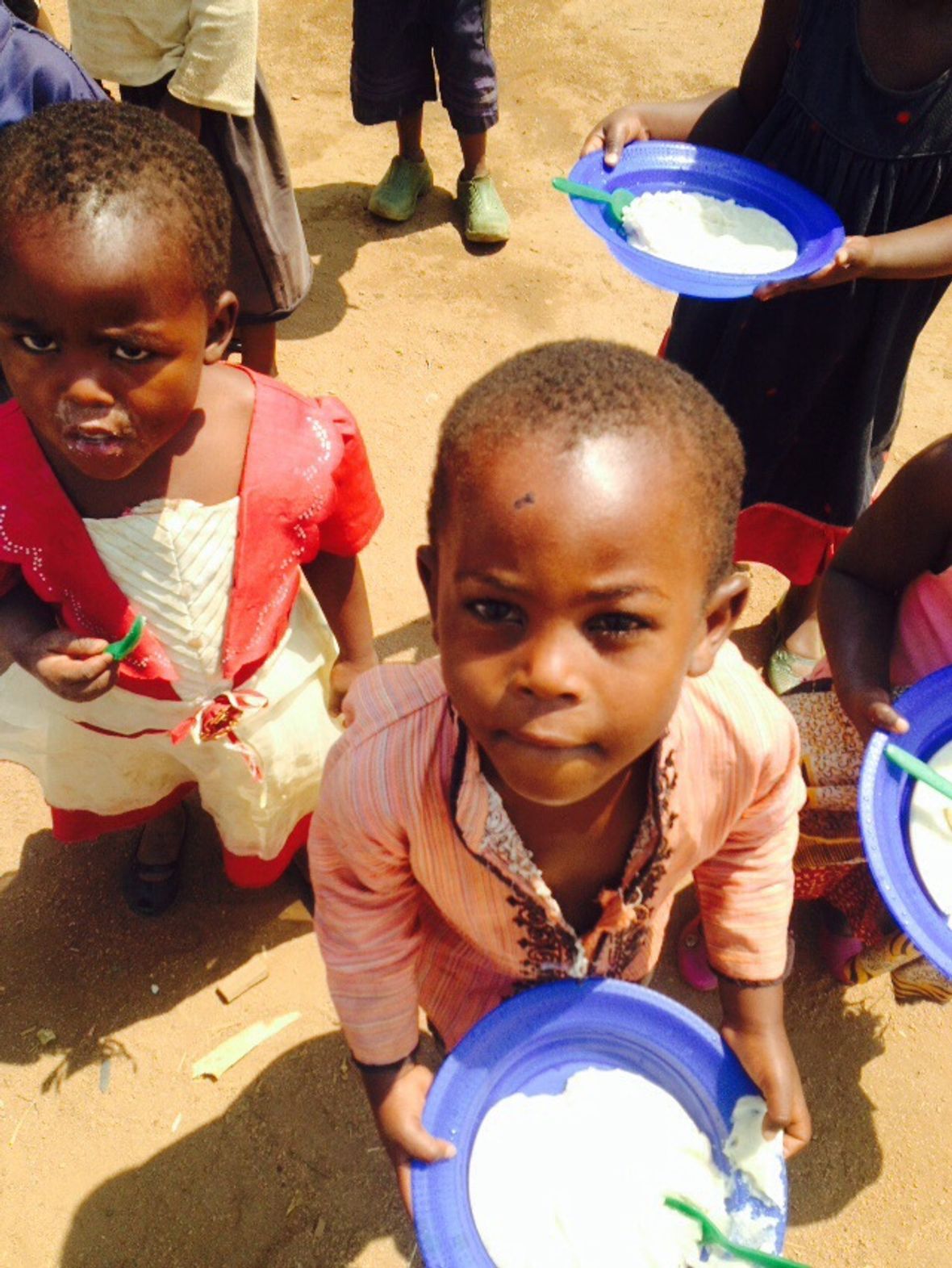 Children at the M’teza CBCC feeding programme