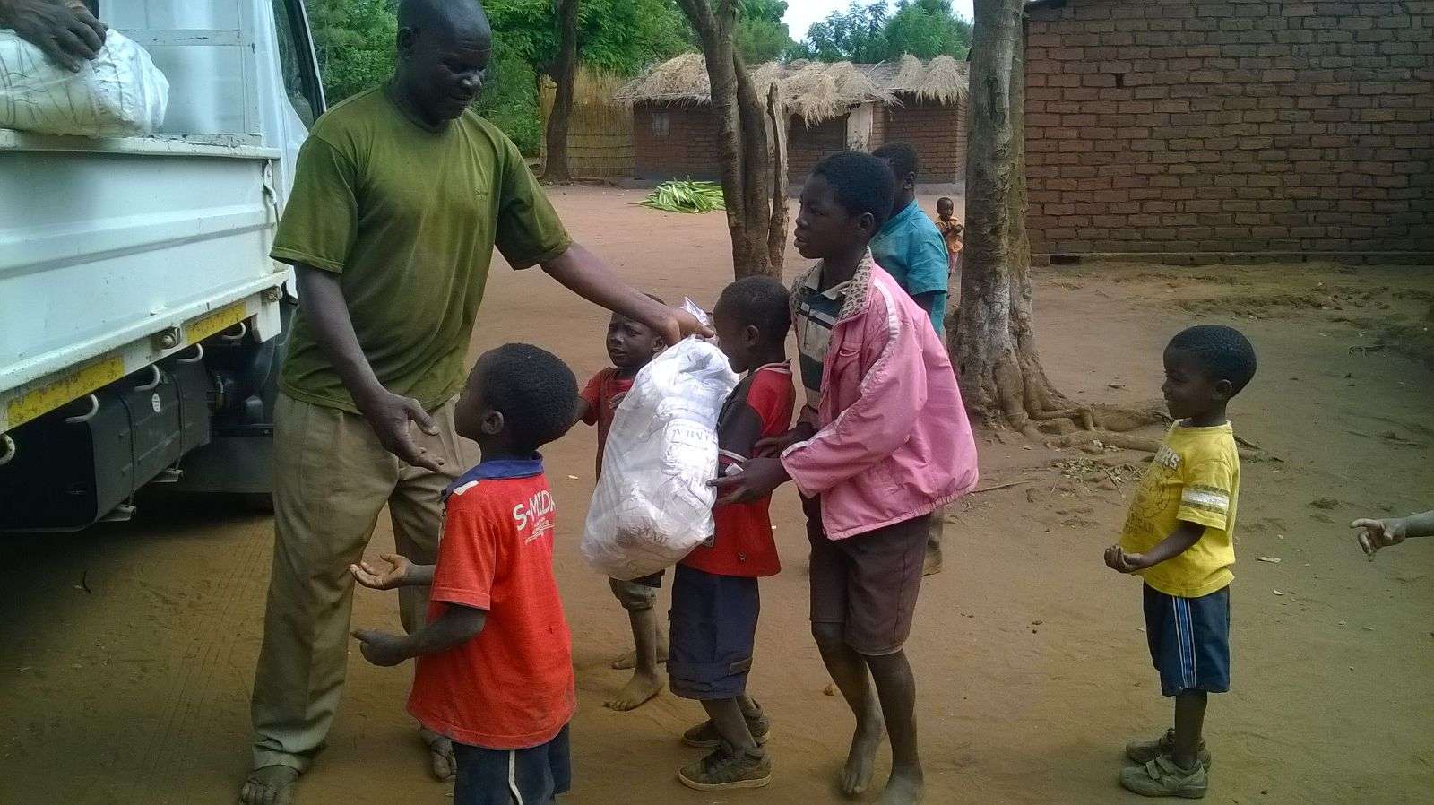 Chiweza II Chief with CBCC children. The involvement of the local communities in our projects is essential to their success.