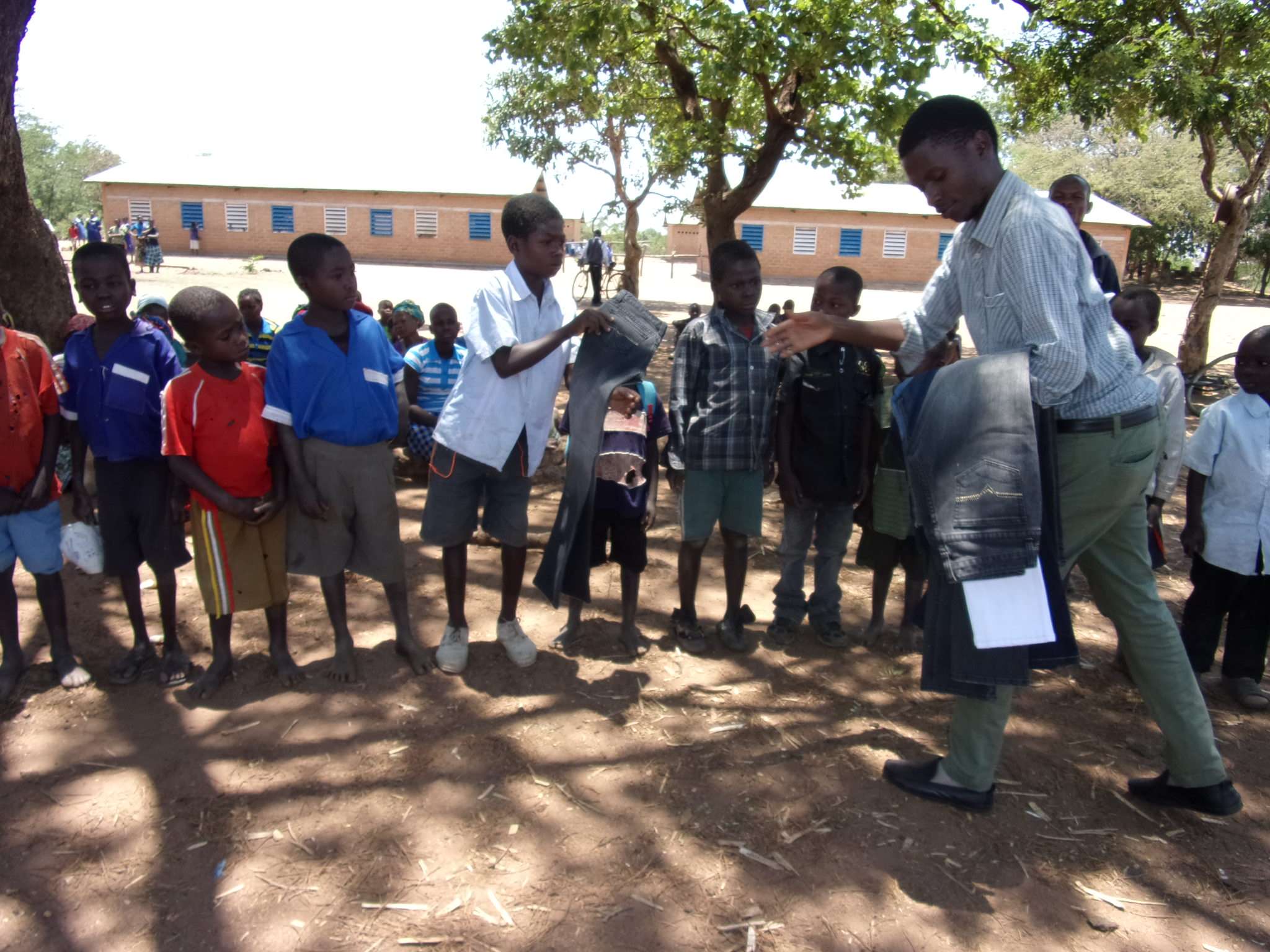 Distribution of jeans, donated by Good News Mission