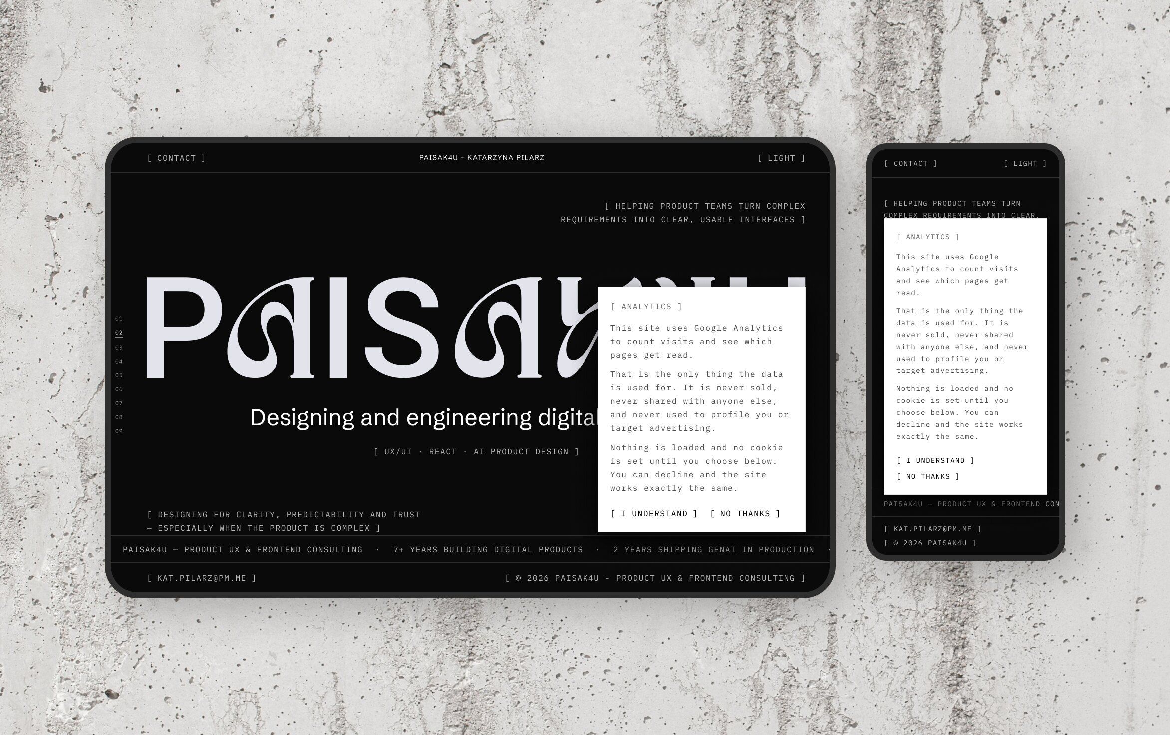 The analytics notice over the PAISAK4U home page in the dark theme, on a tablet and a phone against a concrete wall: what the data is used for, that nothing loads until a choice is made, and the choice between “I understand” and “No thanks”