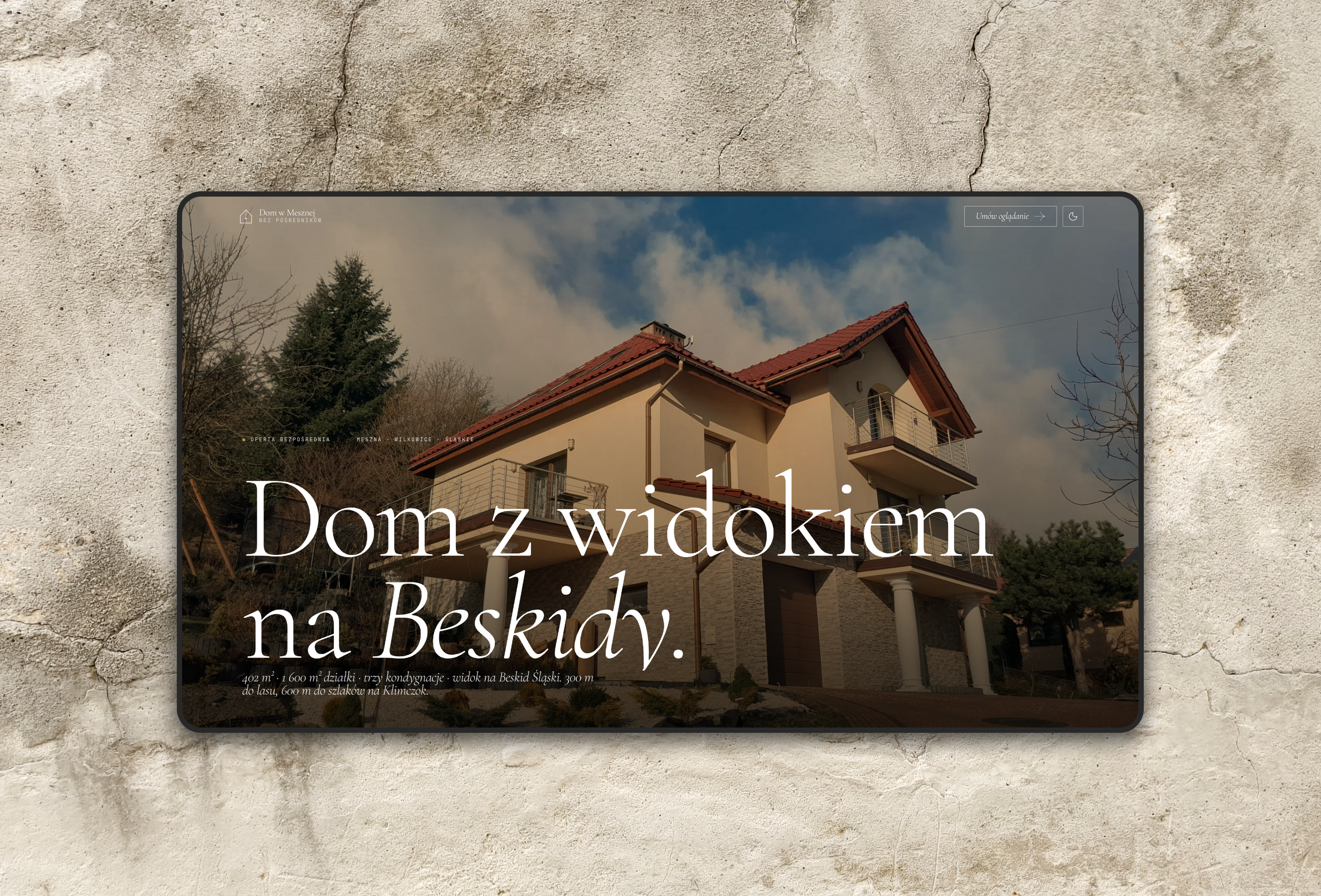 The hero on desktop — the house photographed against the Beskidy sky