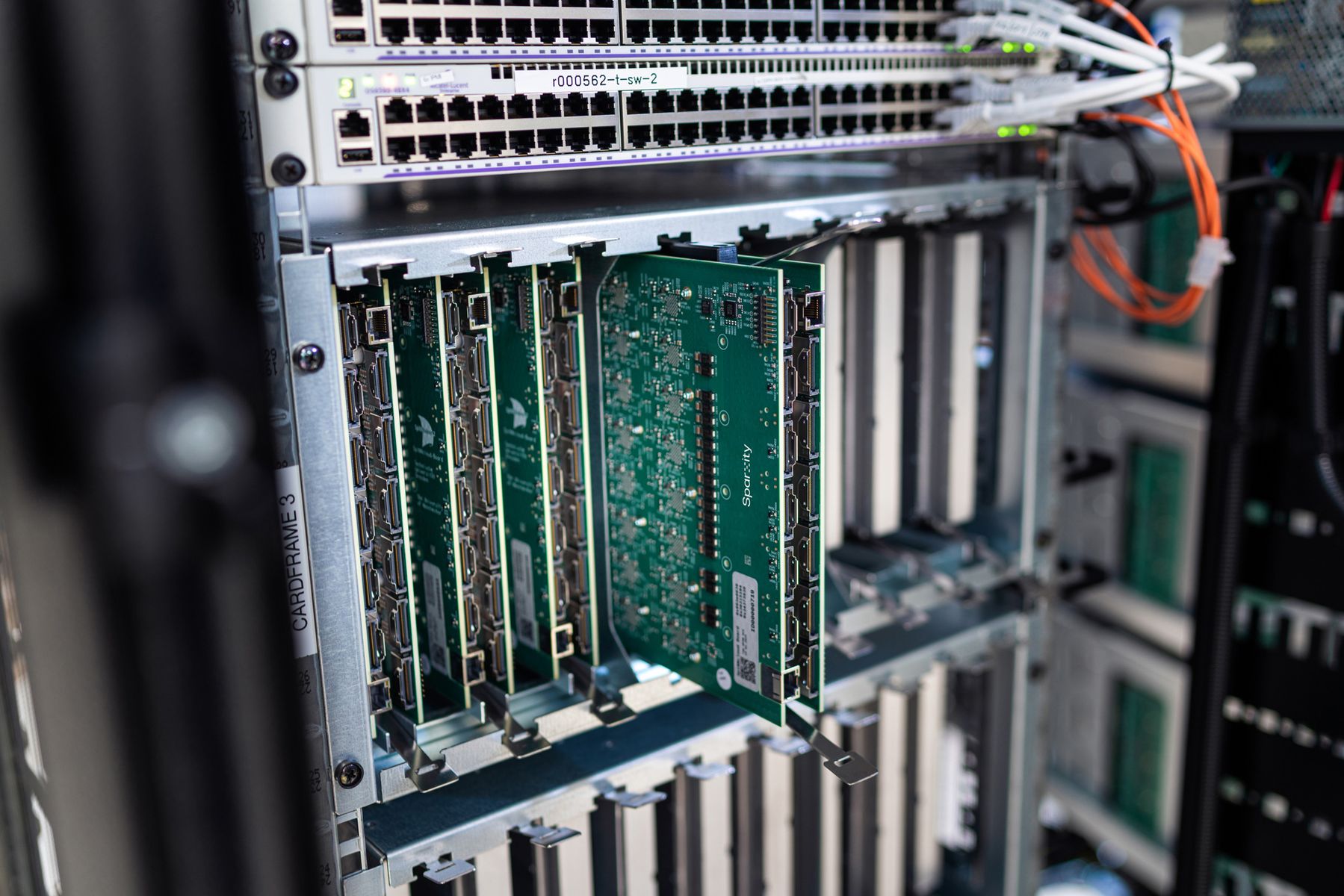 A Sparxity board pulled out of a card frame in a rack