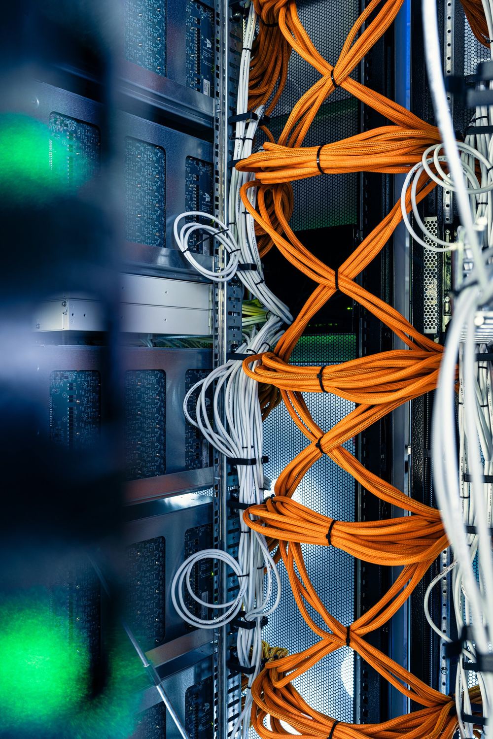 Inside a Sparxity system: boards and bundled orange and white cabling