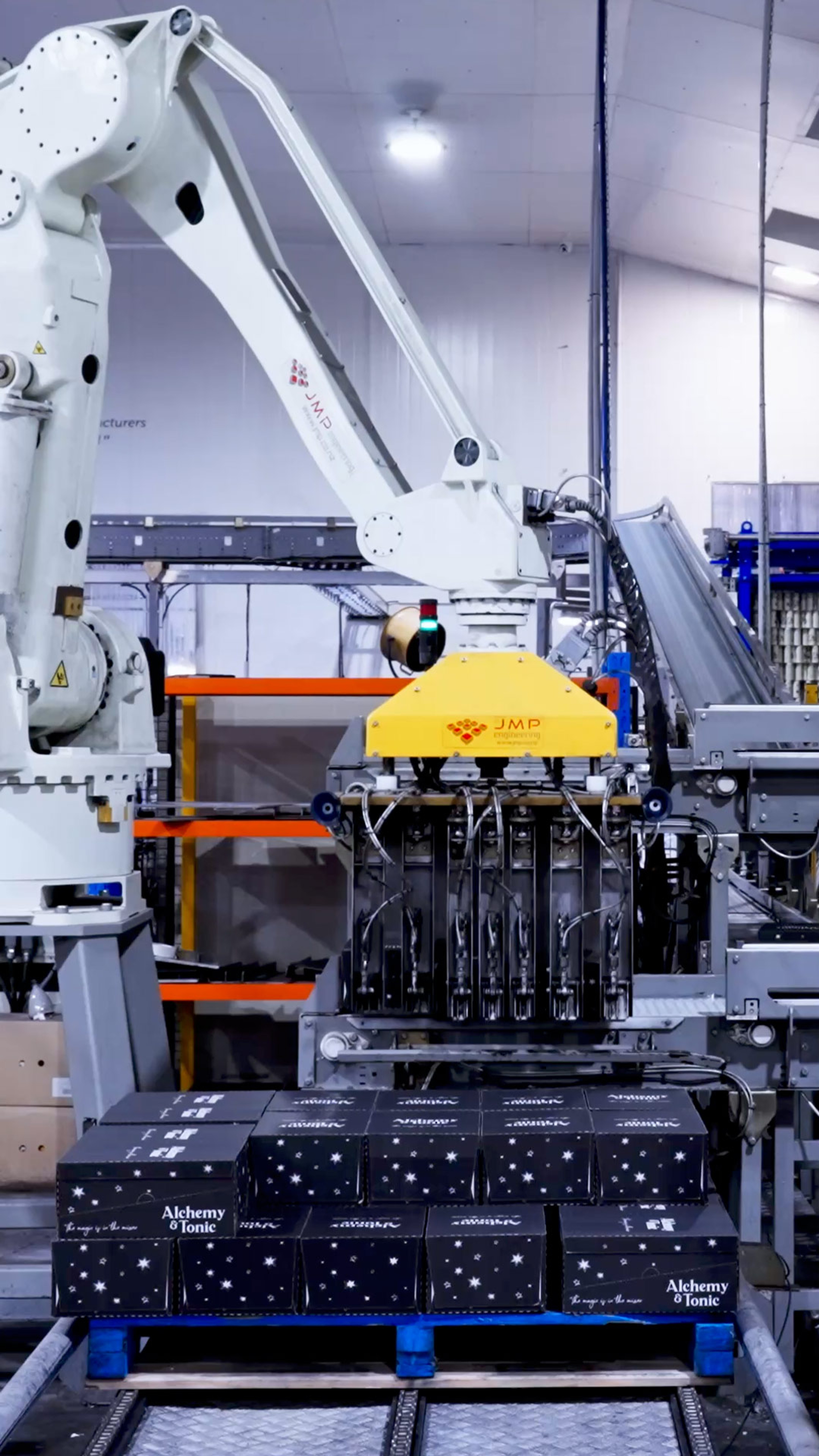 People looking at screen in factory