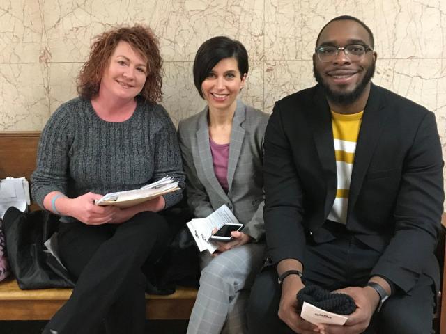 Gina Chiala in court with a tenant and a former HCJF intern in 2021