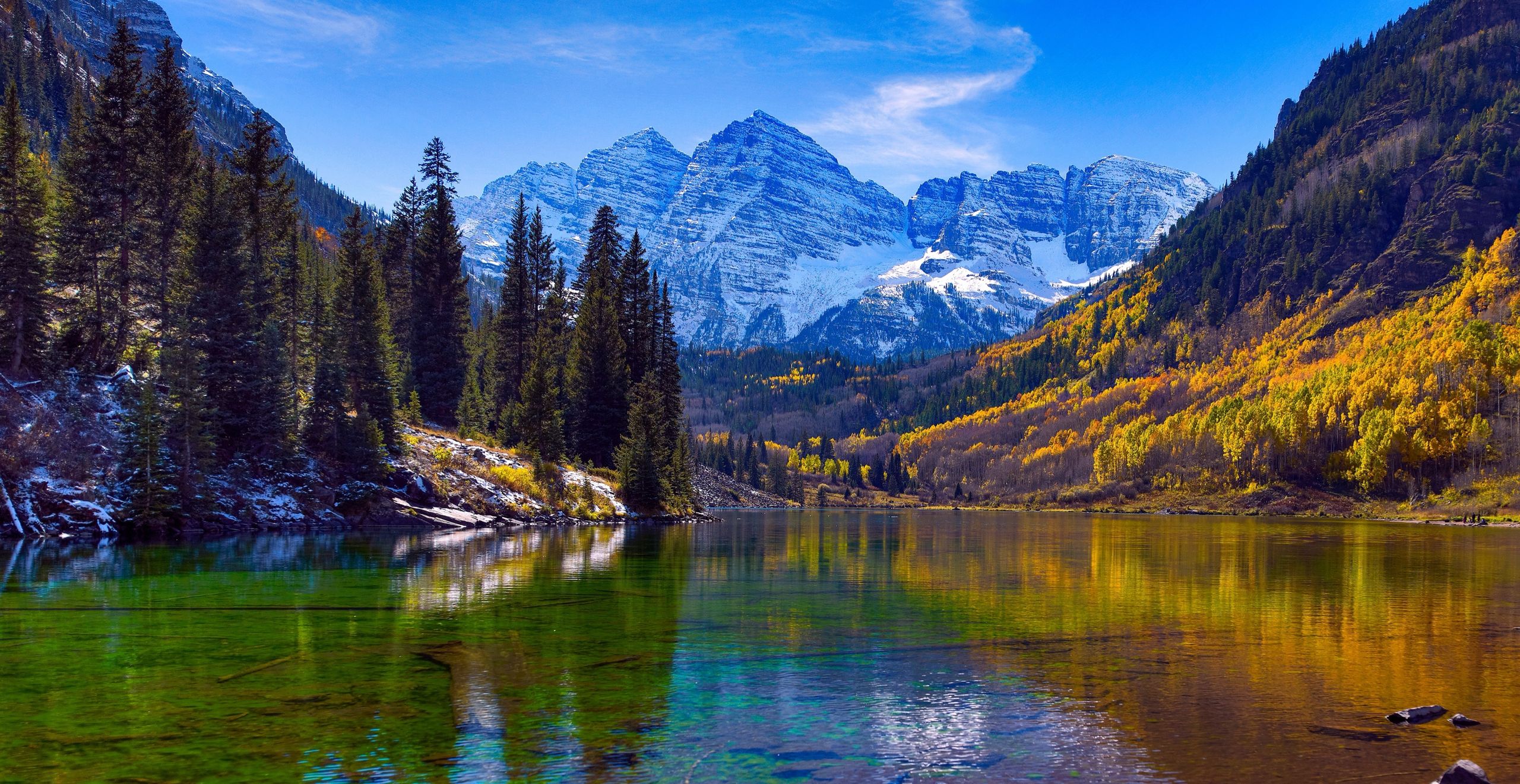 The Maroon Bells near Aspen in autumn, reflected in Maroon Lake