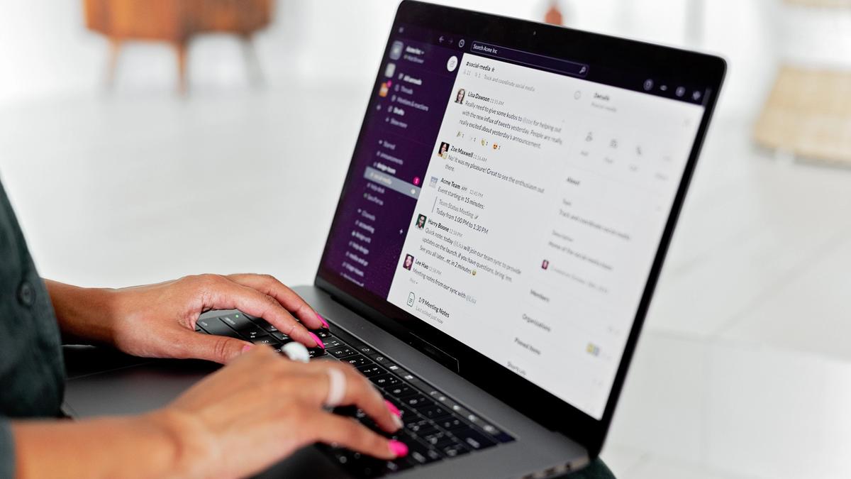 Person using a chat interface on a laptop