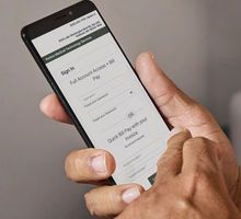 close up of phone with payment portal on screen
